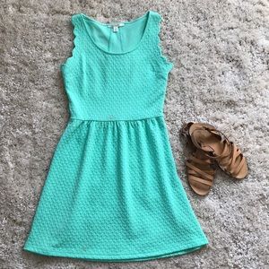 Francesca’s mint scalloped dress
